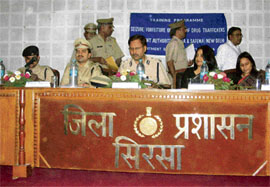 Fatehabad SP Saurabh Singh, Sirsa SP Vikas Arora, Hisar IG A. K. Dhull, competent authority and administrator Archana Ranjan and additional commissioner Priya Sahu during a seminar in Sirsa.