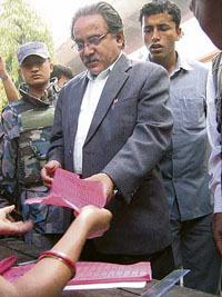 Leader of the Communist Party of Nepal (Maoist) Prachanda casts his vote in Chitwan, about 200 km from Kathmandu, on Thursday. 