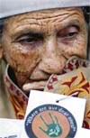 An aged woman in a pensive mood during a protest by the Association of Parents of Disappeared Persons in Srinagar on Thursday.
