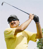 Former Ranji Trophy pace bowler Rakesh Jolly fires a shot on the opening day of the Chandigarh Golfing Tour in Chandigarh