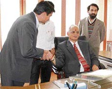 Prof. Sunil Kumar Gupta accepts greetings from staff after joining as the Vice-Chancellor of HP University in Shimla on Friday.
