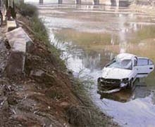 The car of DRI officials that fell into Doraha canal in Ludhiana on Friday.
