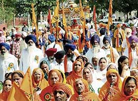 Devotees take out a procession on the eve of Baisakhi in Chandigarh on Saturday.
