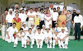 The alumni and the youngsters teams in a joyous mood on the Guru Nanak Public School premises after the match on Saturday.