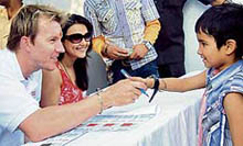 Brett Lee and Priety Zinta sell tickets for IPL matches at PCA, Mohali, on Saturday.