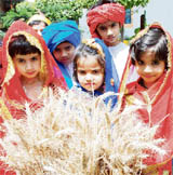 Children celebrate the Baisakhi festival at Doon Vatika School in Karnal