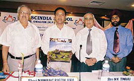 Industries and commerce minister Nawang Rigzin Jora releasing a coffee table book The Fort Pupils in Jammu on Saturday. 