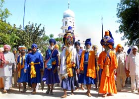 Nihang devotees coming out of the Takht Damdama Sahib after paying obeisance in Talwandi Sabo