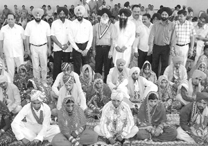 A mass marriage ceremony of 21 poor couples organised by the Rotary Club in progress at Rajpura on Sunday.