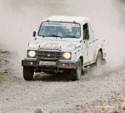 A rallyist negotiates a turn during the SJOBA rally on Sunday.