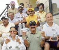 The winners are all smiles after the prize distribution function of the Chandigarh Golfing Tour at the Chandigarh Golf Range on Sunday.