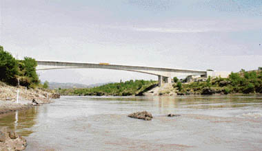 The new concrete bridge over the Chenab at Akhnoor which will be commissioned by Prime Minister Manmohan Singh during his visit to the state later this month