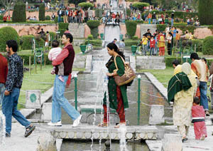 Visitors at the Nishat garden on the outskirts of Srinagar on Sunday. The garden is thrown open to the public on Baisakhi every year. 