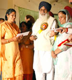 The CM hands over an appointment letter to a newly recruited teacher at the Rajindra College in Bathinda