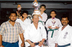 Winners pose with the instructors after a karate training camp at GMT Public School in Ludhiana