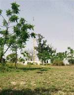 A pennant stands alone at mound where 35,000 Sikhs were massacred by forces of Ahmed Shah Abdalis on February 5, 1762.