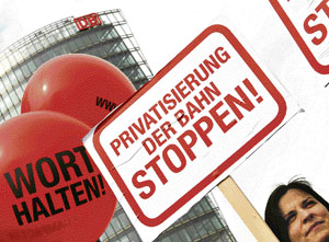 Activists protest against the privatisation of Germanys national rail service Deutsche Bahn (DB) and display placards reading stop the privatisation of the railway in front of its headquarters at Berlins Potsdamer Platz on Monday.
