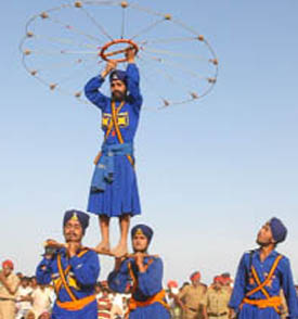 Nihangs display martial arts on the concluding day of the Baisakhi fair in Talwandi Sabo in Bathinda district on Tuesday.