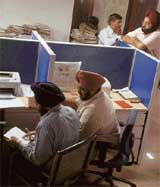 J.P.S. Sidhu, joint director, sports department, being questioned in Chandigarh, on Tuesday.