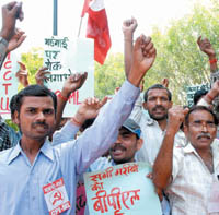 Activists of CPI (ML) shout slogans against price hike at Bhagat Singh Park near ITO in the Capital on Tuesday.