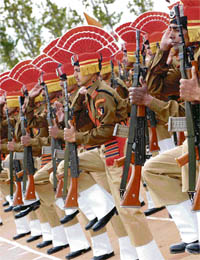 BSF jawans parade during the oath ceremony of 282 trained constables at BSF Training Centre at Humhama Budgam in Srinagar on Tuesday.