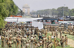 Security personnel during a briefing with senior officials at Rajpath in New Delhi on Tuesday ahead of the Olympic Torch relay on April 17.