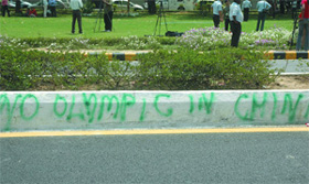A slogan written by Tibetan protesters on a road divider outside the Chinese embassy in the Capital on Wednesday.