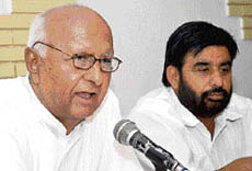 Kaithal MLA and chairman of the All-India Kisan Khet Mazdoor Congress Shamsher Singh Surjewala (left) addresses a press conference in Karnal on Wednesday.