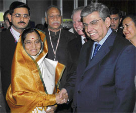 President Pratibha Patil shakes hands with Brazilian Senate President Garibaldi Alves in Brasilia on Tuesday.