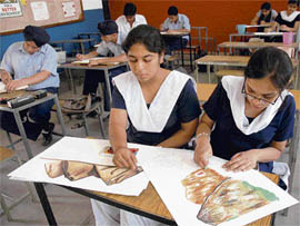 Students participate in a painting competition at GMSSS, Sector 16, in Chandigarh on Thursday.