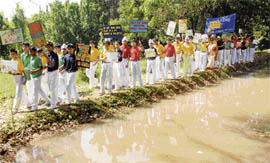 Students of St Kabir Public School march through the Heritage Village site in Sector 26, Chandigarh, on Thursday.
