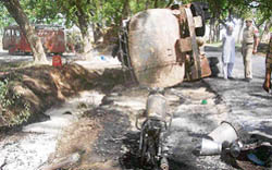A petrol tanker that turned turtle and was allegedly set afire near Bhawani Khera village in Kurukshetra