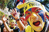 Members of the Tibetan Solidarity Committee hold a protest against the Olympic torch relay run in front of the high court and protesters carry the Torch for Tibet in Shimla on Thursday; and a dharna in progress@@in front of the district administrative complex in Dharamsala on Thursday.