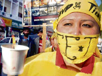 A Tibetan exile during a protest march in Srinagar on Thursday.