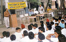 President of the state unit of the IAP Dr Rajinder Gulati delivers a lecture on healthy living at Government Senior Secondary School, Haibowal Khurd, in Ludhiana on Thursday.