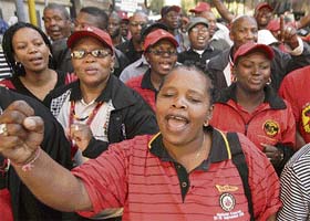 Members of South Africa's Labour Federation march against soaring food prices in Johannesburg