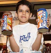 Bollywoods youngest star Darsheel Safari of Tare Zameen Par fame poses with Horlicks jars in New Delhi on Friday.