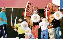 Daggers Drawn: Performers take part in a rehearsal for the opening ceremony of the IPL tie between Kings XI Punjab and Chennai Super Kings at PCA stadium in Mohali