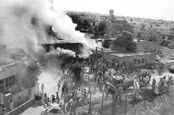 A fire tender tries to control a blaze at a chemical factory in Ambala