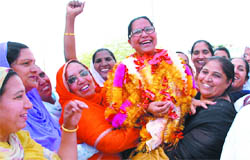 Party activists greet Paramjeet Kaur Gulshan, MP, on Saturday when she came to Bathinda