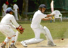 A player hits a shot during the 2nd CCA Under-13 Gold Cup Cricket Tournament at GNPS grounds, Sector 36, Chandigarh