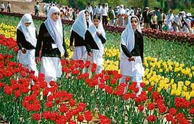 Schoolchildren visit the tulip garden in Srinagar