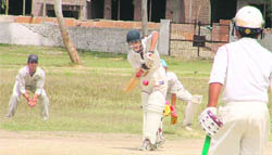 A batsman plays a shot during the cricket tournament being organised by the Ludhiana District Cricket Association in Ludhiana