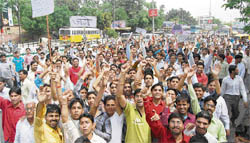 Shoemakers protest outside the deputy commissioners office in Ludhiana