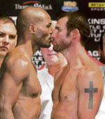 Bernard Hopkins (left) of the US and Joe Calzaghe of Wales face-off after their official weigh-in for their light heavyweight fight at Planet Hollywood Resort & Casino in Las Vegas, Nevada on Friday. Hopkins will fight Calzaghe in Las Vegas on Saturday. 