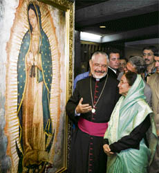 President Pratibha Patil listens to explanations about an image of the Virgin of Guadalupe from the rector of the Basilica de Guadalupe, Diego Monroy, in Mexico City on Friday.