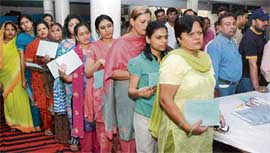 Volunteers wait for their turn at the blood donation camp held at Sant Nirankari Bhawan, Sector 30, Chandigarh, on Sunday.