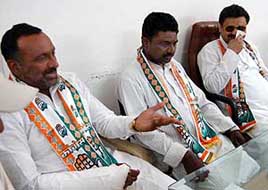 Gautam Prasad (in centre), who was missing since April 9, at the residence of Haryana deputy chief minister Chander Mohan in Panchkula on Sunday.