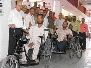 Tricycles being distributed among physically-challenged persons at a polio surgery camp organised by the Bhagwan Mahavir Sewa Sansthan in Ludhiana on Sunday. 