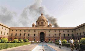 Smoke rises from the South Block in New Delhi